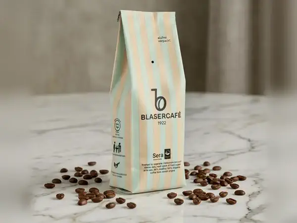 A 250 gram bag of medium-roast Blasercafé decaf coffee beans
