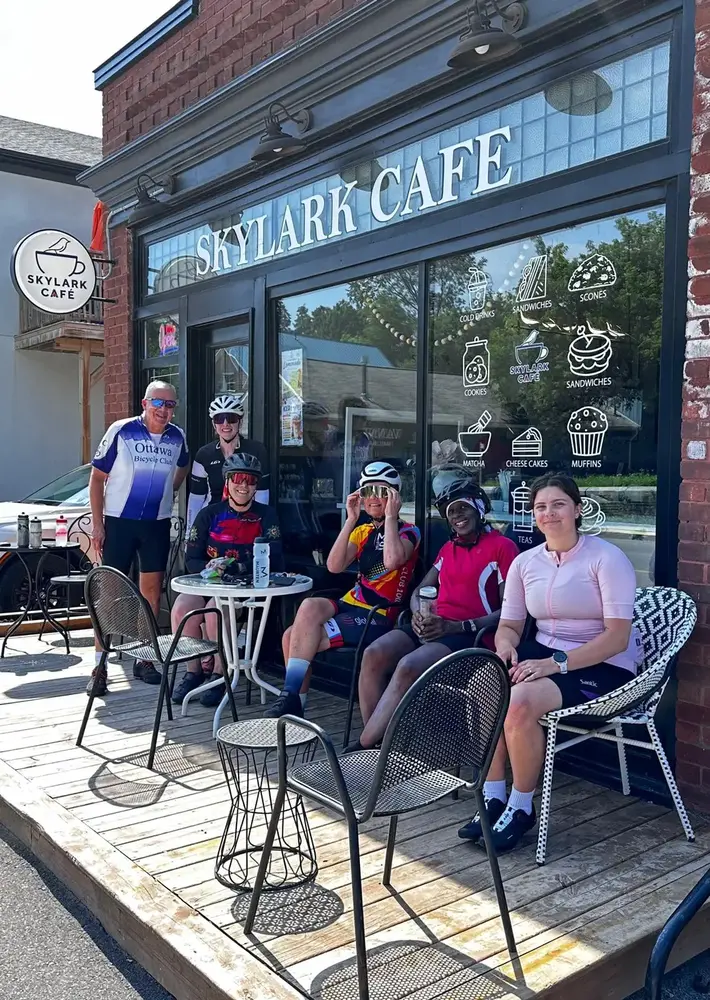 Ottawa cyclists gathered at the tables outside Skylark Café